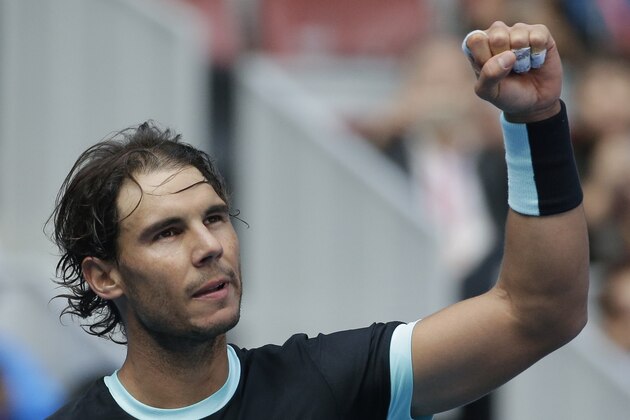 Rafael Nadal of Spain celebrates after defeating Fabio Fognini of Italy in the men's singles semifinals match of the China Open tennis tournament at the National Tennis Stadium in Beijing, Saturday, Oct. 10, 2015. (AP Photo/Andy Wong)