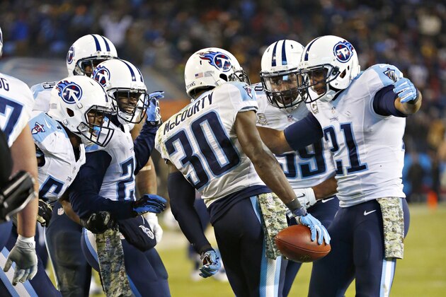 NASHVILLE, TN - NOVEMBER 17:  Jason McCourty #30 of the Tennessee Titans celebrates with teammates after intercepting a pass against the Pittsburgh Steelers at LP Field on November 17, 2014 in Nashville, Tennessee.  The Steelers defeated the Titans 27-24.  (Photo by Wesley Hitt/Getty Images)
