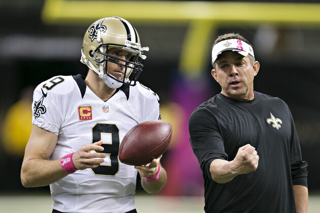 NEW ORLEANS, LA - OCTOBER 5:  Head Coach Sean Payton and Drew Brees #9 of the New Orleans Saints talk before a game against the Tampa Bay Buccaneers at Mercedes-Benz Superdome on October 5, 2014 in New Orleans, Louisiana. The Saints defeated the Buccaneers 37-31.  (Photo by Wesley Hitt/Getty Images)