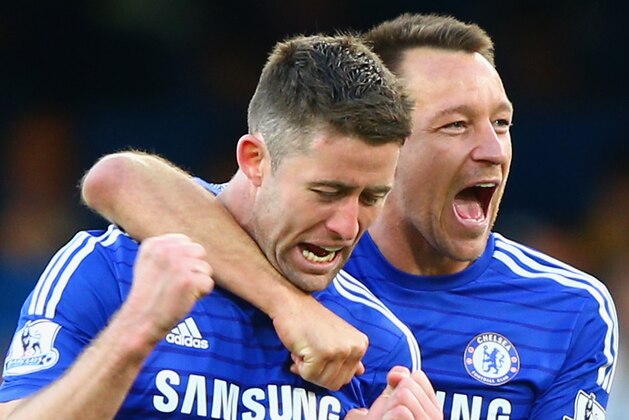 LONDON, ENGLAND - APRIL 18:  John Terry and Gary Cahill of Chelsea celebrate after the Barclays Premier League match between Chelsea and Manchester United at Stamford Bridge on April 18, 2015 in London, England.  (Photo by Ian Walton/Getty Images)