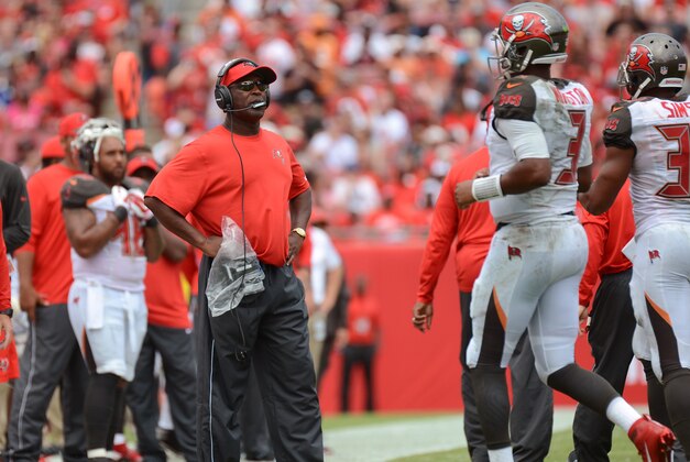 Oct 4, 2015; Tampa, FL, USA; Tampa Bay Buccaneers head coach Lovie Smith talk with Tampa Bay Buccaneers quarterback  Jameis Winston (3) in the first half at Raymond James Stadium. Mandatory Credit: Jonathan Dyer-USA TODAY Sports