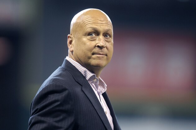 MLB Hall of Fame member Cal Ripken Jr. prepares to throw out the first pitch during a baseball game between the Houston Astros and the Baltimore Orioles, Sunday, June 1, 2014, in Houston. (AP Photo/Patric Schneider)