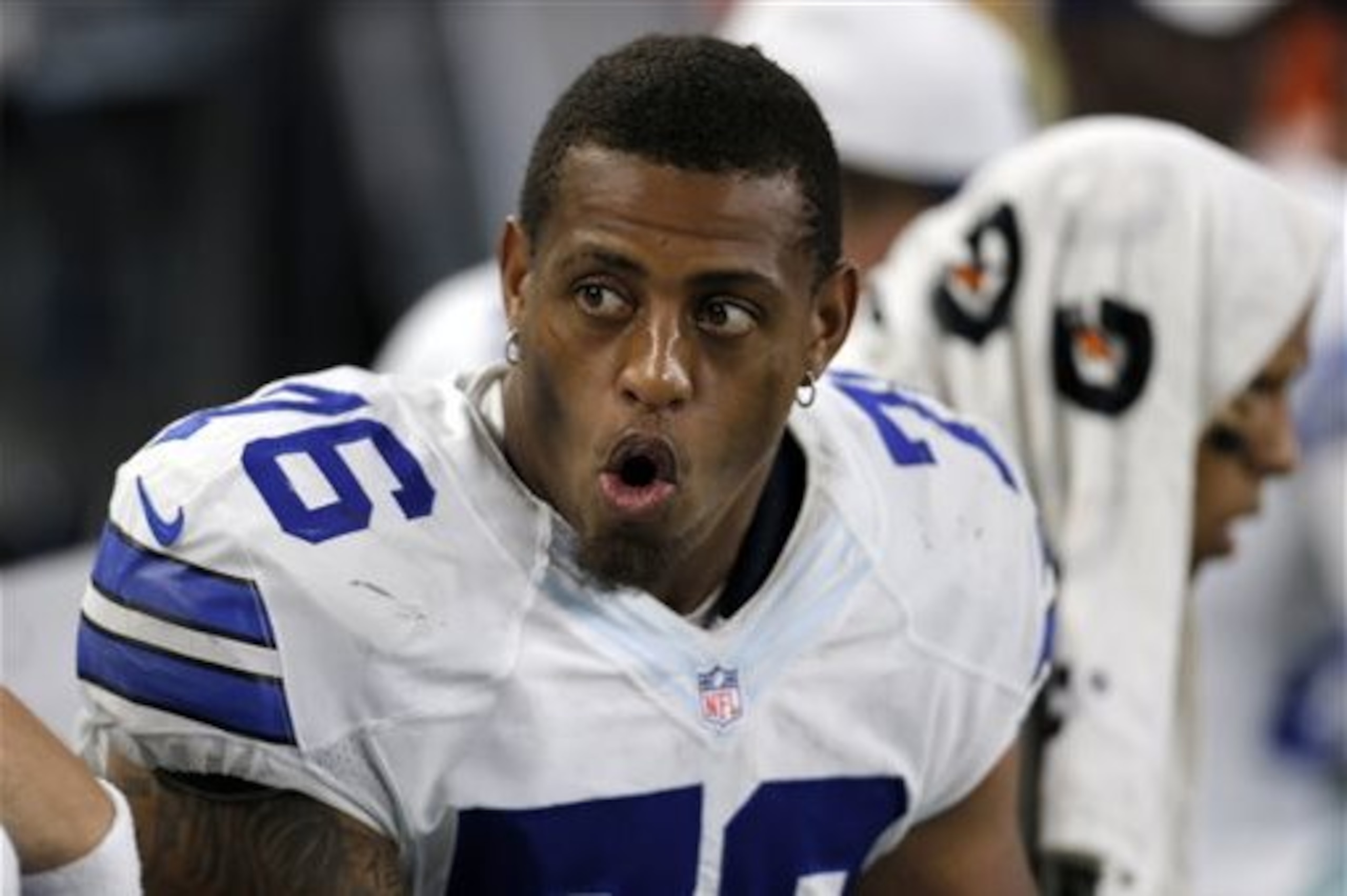 FILE - In this Aug. 29, 2015, file photo, Dallas Cowboys defensive end Greg Hardy (76) talks with teammates on the sideline during a preseason NFL football game against the Minnesota Vikings in Arlington, Texas. Several teams will be missing key players when the NFL season kicks off this weekend.  (AP Photo/Brandon Wade, File)