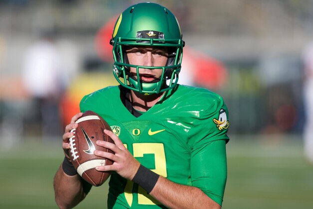 Sep 26, 2015; Eugene, OR, USA; Oregon Ducks quarterback Taylor Alie (12) throws the ball before the game against the Utah Utes at Autzen Stadium. Mandatory Credit: Scott Olmos-USA TODAY Sports