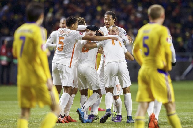 (L-R) Ulan Konysbayev of Kazachstan, Jeffrey Bruma of Holland, Jairo Riedewald of Holland, Daley Blind of Holland, Georginio Wijnaldum of Holland, Kerim Rekik of Holland, Anwar El Ghazi of Holland of Holland, Wesley Sneijder of Holland, Islambek Kuat of Kazachstan during the EURO 2016 qualifying match between Kazachstan and The Netherlands on October 10, 2015 at the Astana Arena in Astana, Kazachstan.(Photo by VI Images via Getty Images)