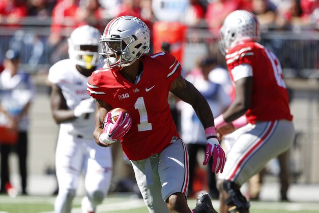 Oct 10, 2015; Columbus, OH, USA; Ohio State Buckeyes wide receiver Braxton Miller (1) runs the ball during the second quarter versus the Maryland Terrapins at Ohio Stadium. Mandatory Credit: Joe Maiorana-USA TODAY Sports