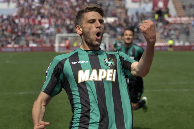 Sassuolo's Domenico Berardi celebrates after scoring a goal during their Serie A soccer match against Torino, at Reggio Emilia's Mapei stadium, Italy, Sunday, April 19, 2015. (AP Photo/Marco Vasini)