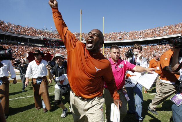 Oct 10, 2015; Dallas, TX, USA; Texas Longhorns head coach Charlie Strong celebrates winning the game against the Oklahoma Sooners during the Red River rivalry at Cotton Bowl Stadium. Texas won 24-17. Mandatory Credit: Tim Heitman-USA TODAY Sports