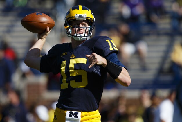 Oct 10, 2015; Ann Arbor, MI, USA; Michigan Wolverines quarterback Jake Rudock (15) warms up prior to the game against the Northwestern Wildcats at Michigan Stadium. Mandatory Credit: Rick Osentoski-USA TODAY Sports