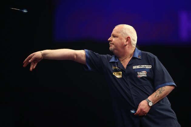 LONDON, ENGLAND - DECEMBER 27:  Robert Thornton of Scotland in action in his second round match against Ronnie Baxter of England during Day Seven of the William Hill PDC World Darts Championships at Alexandra Palace on December 27, 2014 in London, England.  (Photo by Jordan Mansfield/Getty Images)