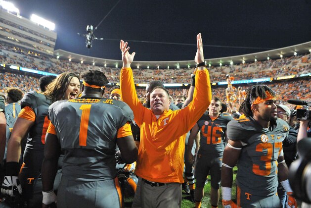 Oct 10, 2015; Knoxville, TN, USA; Tennessee Volunteers head coach Butch Jones waves to fans after his team defeated the Georgia Bulldogs during the second half at Neyland Stadium. Tennessee won 38-31. Mandatory Credit: Jim Brown-USA TODAY Sports