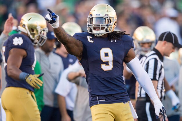 Oct 10, 2015; South Bend, IN, USA; Notre Dame Fighting Irish linebacker Jaylon Smith (9) celebrates a fumble recovery in the third quarter against the Navy Midshipmen at Notre Dame Stadium. Notre Dame won 41-24. Mandatory Credit: Matt Cashore-USA TODAY Sports