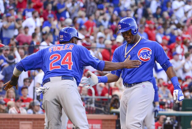 Oct 10, 2015; St. Louis, MO, USA; Chicago Cubs right fielder Jorge Soler (right) is congratulated by center fielder Dexter Fowler (24) for both scoring on a two-run home run by Soler against the St. Louis Cardinals during the second inning in game two of the NLDS at Busch Stadium. Mandatory Credit: Jeff Curry-USA TODAY Sports