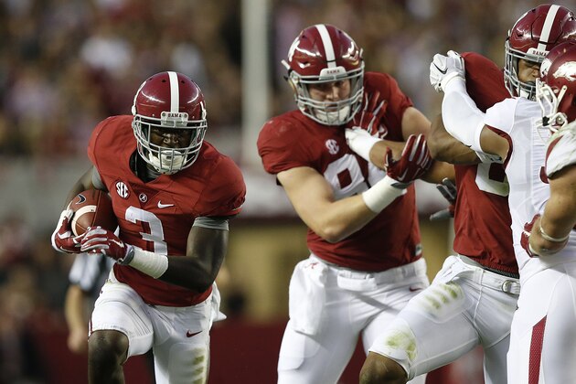 Alabama wide receiver Calvin Ridley (3) runs the ball against Arkansas in the first half of an NCAA college football game, Saturday, Oct. 10, 2015, in Tuscaloosa, Ala. (AP Photo/Brynn Anderson)