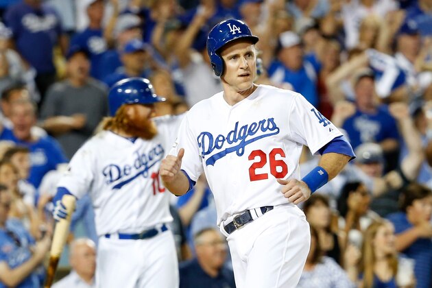 LOS ANGELES, CA - OCTOBER 10:  Chase Utley #26 of the Los Angeles Dodgers reacts after scoring in the seventh inning against the New York Mets in game two of the National League Division Series at Dodger Stadium on October 10, 2015 in Los Angeles, California.  (Photo by Sean M. Haffey/Getty Images)