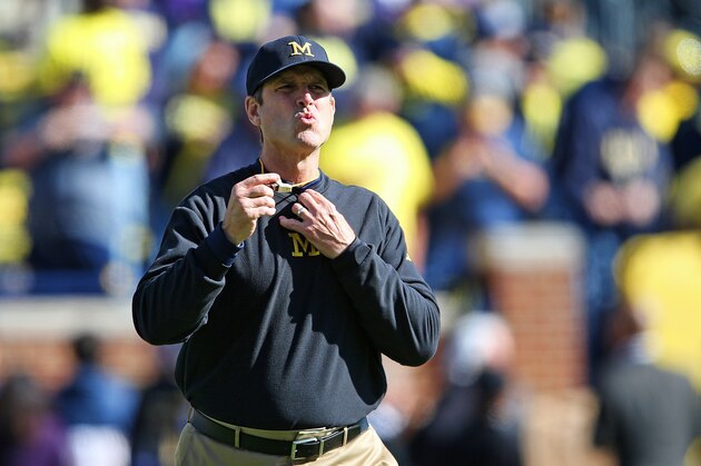 ANN ARBOR MI - OCTOBER 10: Michigan Wolverines head football coach Jim Harbaugh watches the pregame warms ups prior to the start of the game against the Northwestern Wildcats on October 10, 2015 at Michigan Stadium in Ann Arbor, Michigan. The Wolverines defeated the Wildcats 38-0. (Photo by Leon Halip/Getty Images)
