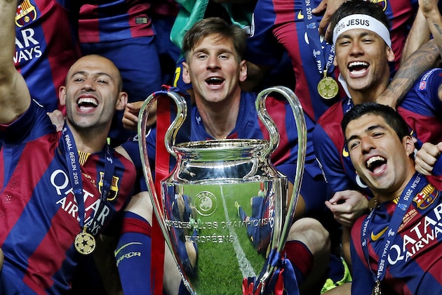 (L-R) Javier Mascherano, Lionel Messi, Neymar, Luis Suarez, Sergio Busquets, Daniel Alves of FC Barcelona posing with the Cup during the UEFA Champions League  final match between Barcelona and Juventus on June 6, 2015 at the Olympic stadium in Berlin, Germany.(Photo by VI Images via Getty Images)