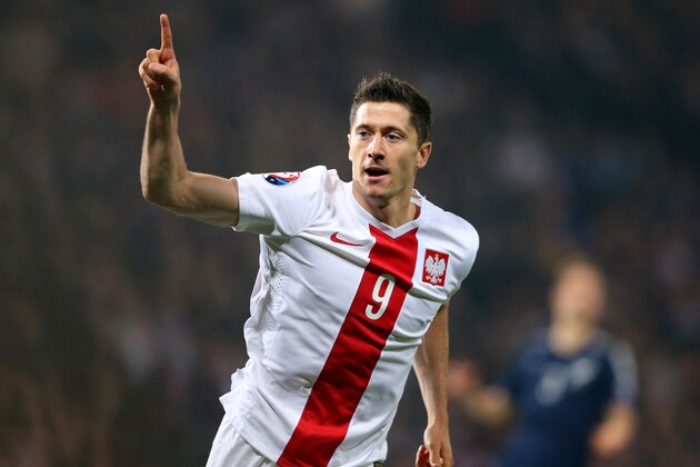 Poland's captain Robert Lewandowski celebrates his goal against Scotland during the Euro 2016 Group D qualifying soccer match at Hampden Park, Glasgow, Scotland, Thursday Oct. 8, 2015. (AP Photo/Scott Heppell)