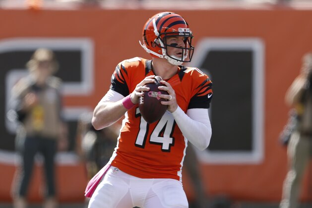 Cincinnati Bengals quarterback Andy Dalton looks to pass in the first half of an NFL football game against the Kansas City Chiefs, Sunday, Oct. 4, 2015, in Cincinnati. (AP Photo/Gary Landers)