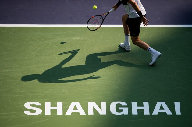 Nicholas Mahout of France hits a return against Lu Yen-Hsun of Taiwan during their men's singles qualifying match at the Shanghai Masters tennis tournament in Shanghai on October 11, 2015.     AFP PHOTO / JOHANNES EISELE        (Photo credit should read JOHANNES EISELE/AFP/Getty Images)
