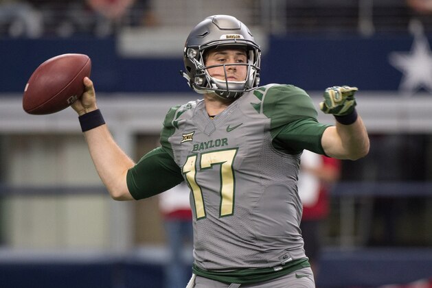 Oct 3, 2015; Arlington, TX, USA; Baylor Bears quarterback Seth Russell (17) throws against the Texas Tech Red Raiders during the first quarter at AT&T Stadium. Mandatory Credit: Jerome Miron-USA TODAY Sports