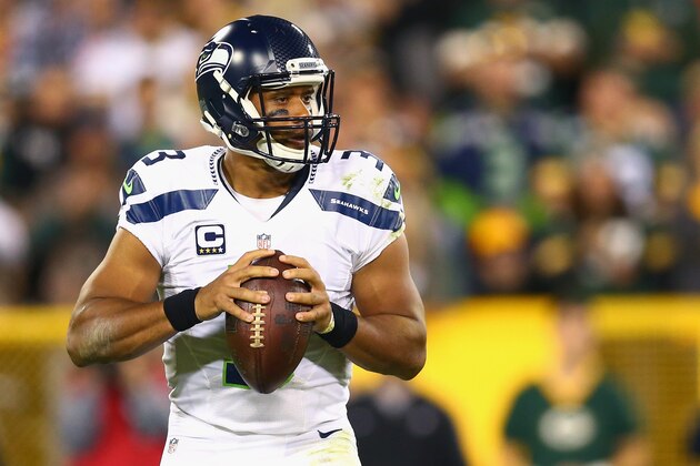 GREEN BAY, WI - SEPTEMBER 20:   Russell Wilson #3 of the Seattle Seahawks looks for a pass during the game against the Green Bay Packers at Lambeau Field on September 20, 2015 in Green Bay, Wisconsin.  (Photo by Maddie Meyer/Getty Images)