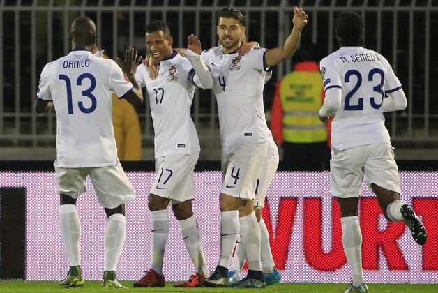 BELGRADE, SERBIA - OCTOBER 11: Nani (C) of Portugal celebrates scoring a goal with team mates Miguel Veloso (R) and Danilo (L) during the Euro 2016 qualifying football match between Serbia and Portugal at the Stadium FC Partizan in Belgrade on October 11, 2015.  (Photo by Srdjan Stevanovic/Getty Images)