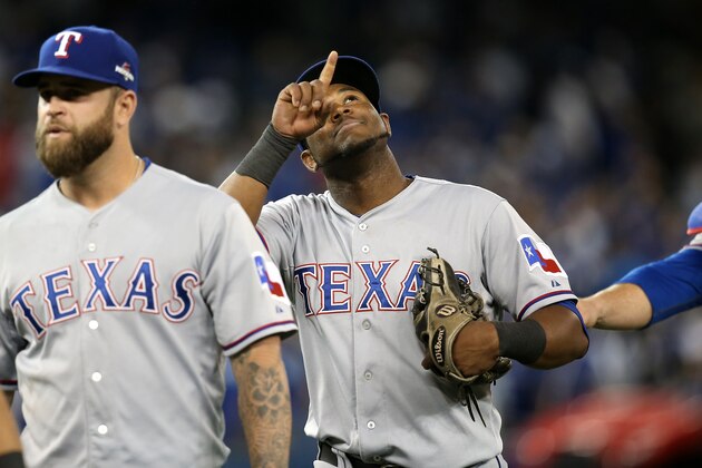 TORONTO, ON - OCTOBER 09: Hanser Alberto #68 of the Texas Rangers celebrates after defeating the Toronto Blue Jays 6-4 during game two of the American League Division Series at Rogers Centre on October 9, 2015 in Toronto, Canada.  (Photo by Tom Szczerbowski/Getty Images)