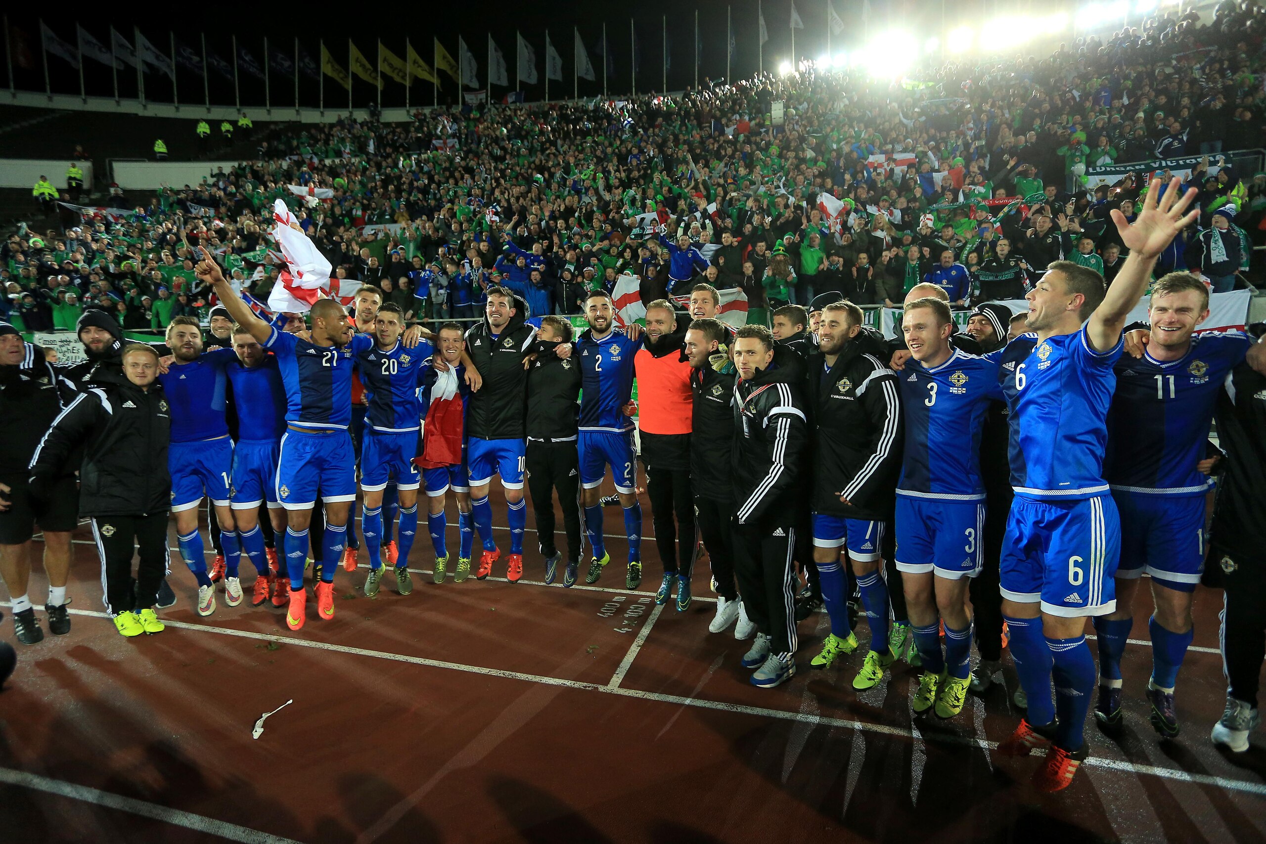 HELSINKI, FINLAND - OCTOBER 11:  Northern Ireland players celebrate after the UEFA EURO 2016 Qualifying match between Finland and Northern Ireland at the Olympic Stadium on October 11, 2015 in Helsinki, Finland. (Photo by Stephen Pond/Getty Images)