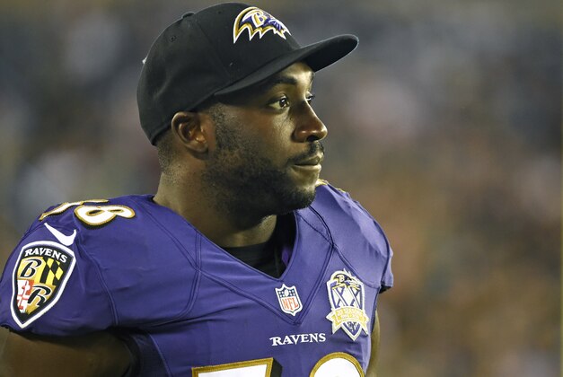 Aug 22, 2015; Philadelphia, PA, USA; Baltimore Ravens outside linebacker Elvis Dumervil (58) watches game against the Philadelphia Eagles during the second half at Lincoln Financial Field. The Eagles defeated the Ravens, 40-17. Mandatory Credit: Eric Hartline-USA TODAY Sports