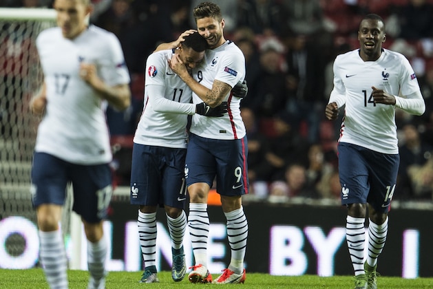 France's forward Olivier Giroud (2nd R) celebrates scoring his side's 2nd goal with team mate France's forward Anthony Martial (2nd L) during a friendly international football match between Denmark and the hosts of the Euro 2016 France at Parken arena in Copenhagen on October 11, 2015. AFP PHOTO / ODD ANDERSEN        (Photo credit should read ODD ANDERSEN/AFP/Getty Images)