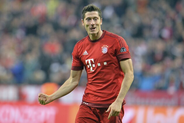 Bayern's Robert Lewandowski celebrates after scoring during the Champions League group F soccer match between Bayern Munich and Dinamo Zagreb in Munich, Germany, Tuesday, Sept. 29, 2015.(AP Photo/Kerstin Joensson)