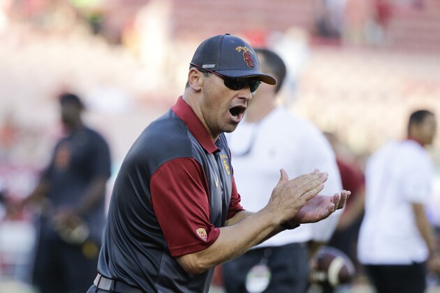 Southern California head coach Steve Sarkisian fires up his players before an NCAA college football game against Washington, Thursday, Oct. 8, 2015, in Los Angeles. (AP Photo/Jae C. Hong)