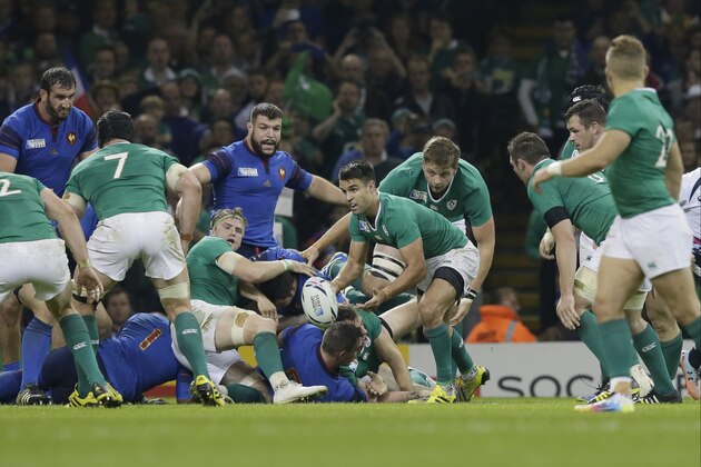 Ireland's Conor Murray throws the ball during the Rugby World Cup Pool D match between France and Ireland at the Millennium Stadium, Cardiff, Sunday, Oct. 11, 2015. (AP Photo/Tim Ireland)