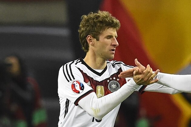 Germany's defender Mats Hummels (R) gratulates Germany's midfielder Thomas Mueller after scoring during the Euro 2016 Group D qualifying football match between Germany and Georgia in Leipzig, eastern Germany, on October 11, 2015. AFP PHOTO / TOBIAS SCHWARZ        (Photo credit should read TOBIAS SCHWARZ/AFP/Getty Images)
