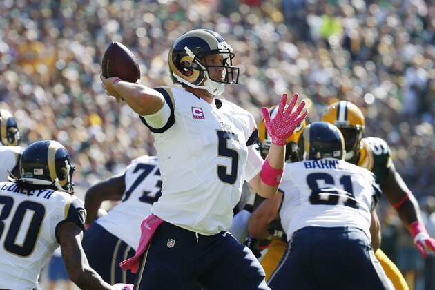 St. Louis Rams' Nick Foles throws during the first half an NFL football game against the Green Bay Packers Sunday, Oct. 11, 2015, in Green Bay, Wis. (AP Photo/Mike Roemer)