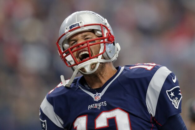 New England Patriots' Tom Brady celebrates after scoring on a 1-yard run against the Dallas Cowboys during the first half of an NFL football game, Sunday, Oct. 11, 2015, in Arlington, Texas. (AP Photo/Brandon Wade) New England Patriots' Tom Brady celebrates after scoring on a 1-yard run against the Dallas Cowboys during the first half of an NFL football game, Sunday, Oct. 11, 2015, in Arlington, Texas. (AP Photo/Brandon Wade)