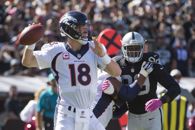 October 11, 2015; Oakland, CA, USA; Denver Broncos quarterback Peyton Manning (18) passes the football against the Oakland Raiders during the first quarter at O.co Coliseum. Mandatory Credit: Kyle Terada-USA TODAY Sports October 11, 2015; Oakland, CA, USA; Denver Broncos quarterback Peyton Manning (18) passes the football against the Oakland Raiders during the first quarter at O.co Coliseum. Mandatory Credit: Kyle Terada-USA TODAY Sports