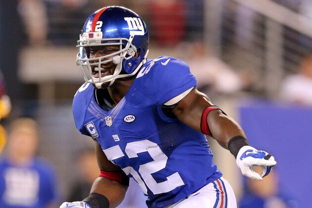 Sep 24, 2015; East Rutherford, NJ, USA; New York Giants linebacker Jon Beason (52) calls a defensive play against the Washington Redskins during the third quarter at MetLife Stadium. Mandatory Credit: Brad Penner-USA TODAY Sports