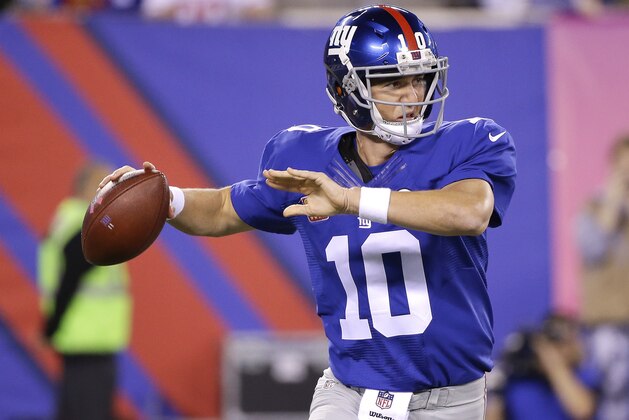 New York Giants quarterback Eli Manning (10) passes the ball against the San Francisco 49ers during the second quarter of an NFL football game, Sunday, Oct. 11, 2015, in East Rutherford, N.J. (AP Photo/Seth Wenig)