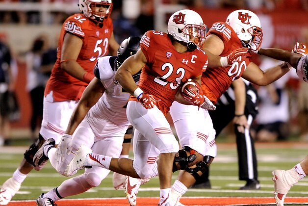 SALT LAKE CITY, UT - OCTOBER 10: Running back Devontae Booker #23 of the Utah Utes ran for 222 yards in the 30-24 win over the California Golden Bears at Rice-Eccles Stadium on October 10, 2015 in Salt Lake City, Utah. (Photo by Gene Sweeney Jr/Getty Images)