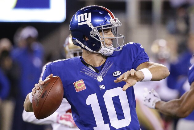 New York Giants quarterback Eli Manning (10) passes the gall against the San Francisco 49ers during the first quarter of an NFL football game, Sunday, Oct. 11, 2015, in East Rutherford, N.J. (AP Photo/Seth Wenig)