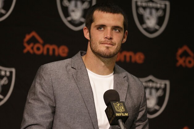 Oakland Raiders quarterback Derek Carr speaks at a news conference after an NFL football game against the Denver Broncos in Oakland, Calif., Sunday, Oct. 11, 2015. The Broncos won 16-10.  (AP Photo/Ben Margot)