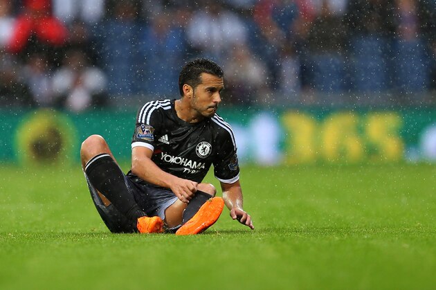 WEST BROMWICH, ENGLAND - AUGUST 23:  Pedro of Chelsea sits on the pitch during the Barclays Premier League match between West Bromwich Albion and Chelsea on August 23, 2015 in West Bromwich, United Kingdom.  (Photo by Catherine Ivill - AMA/Getty Images)