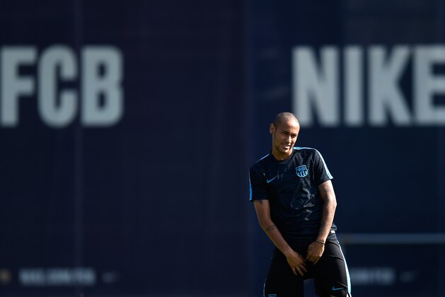 BARCELONA, SPAIN - SEPTEMBER 28:  Neymar of FC Barcelona looks on during a training session ahead of their UEFA Champions League Group E match against Bayern 04 Leverkusen at Ciutat Esportiva on September 28, 2015 in Barcelona, Spain.  (Photo by David Ramos/Getty Images)