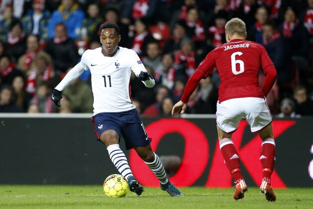 COPENHAGEN, DENMARK - OCTOBER 11:  Anthony Martial of France and Lars Jacobsen of Denmark in action during the international friendly match between Denmark and France at Telia Parken Stadium on October 11, 2015 in Copenhagen, Denmark. (Photo by Jean Catuffe/Getty Images)