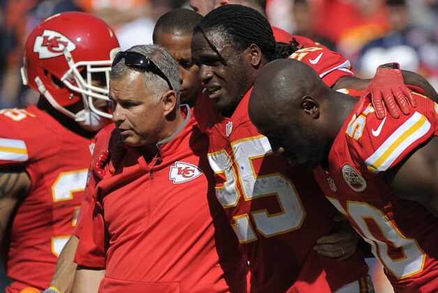 Kansas City Chiefs running back Jamaal Charles (25) is helped off the field after an injury in the second half of an NFL football game against the Chicago Bears in Kansas City, Mo., Sunday, Oct. 11, 2015. (AP Photo/Ed Zurga)