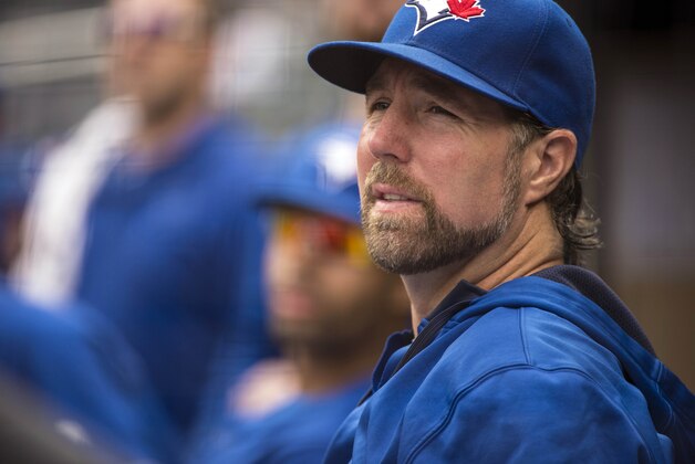 Sep 12, 2015; Bronx, NY, USA; Toronto Blue Jays pitcher R.A. Dickey (43) looks on from the dugout during the first inning of the game against the New York Yankees during the first game of a doubleheader at Yankee Stadium. Mandatory Credit: Gregory J. Fisher-USA TODAY Sports