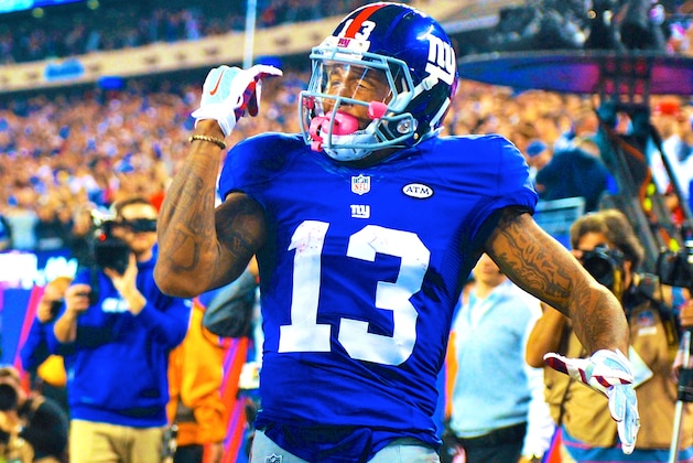 CINCINNATI, OH - OCTOBER 11:  Mike Nugent #2 is congratulated by Giovani Bernard #25 and Andy Dalton #14, of the Cincinnati Bengals after kicking the game winning field goal in overtime to defeat the Seattle Seahawks 27-24 at Paul Brown Stadium on October 11, 2015 in Cincinnati, Ohio. (Photo by John Grieshop/Getty Images)