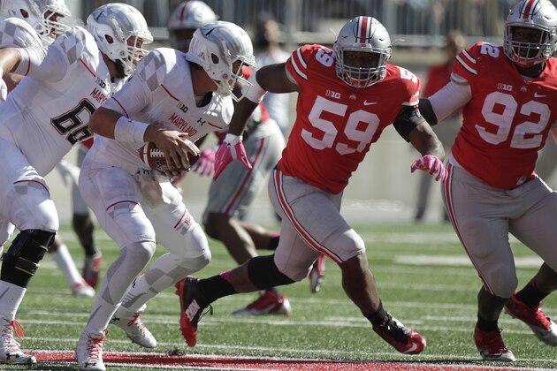 Ohio State defensive lineman Tyquan Lewis plays against Maryland in an NCAA college football game Saturday, Oct. 10, 2015, in Columbus, Ohio. (AP Photo/Jay LaPrete)